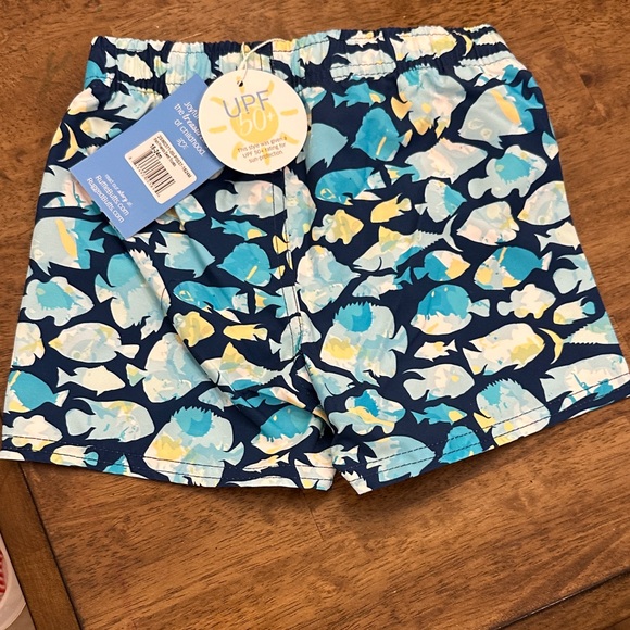 Ruffle Butts Blue and Yellow Fish Friends Swim Trunks - Picture 5 of 5